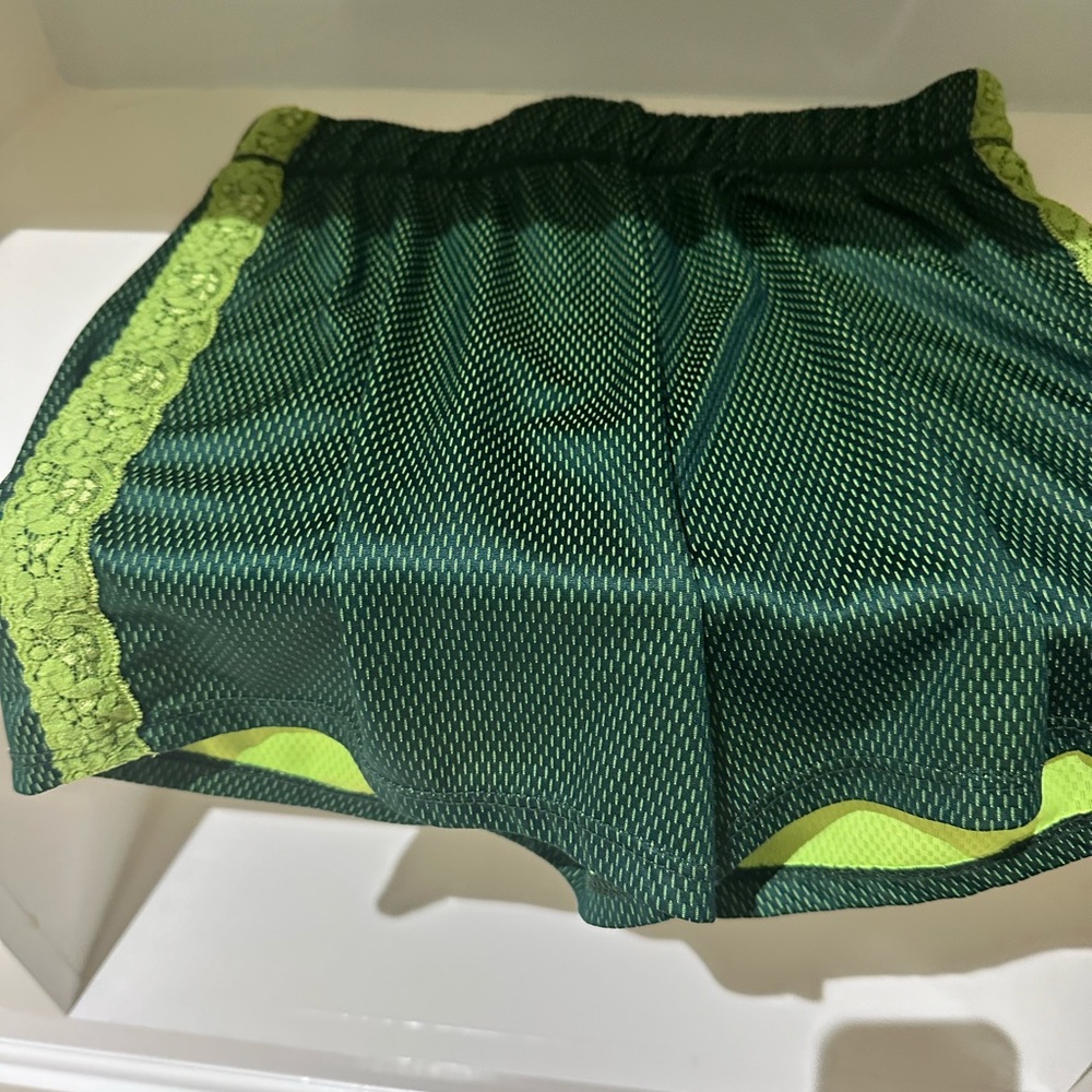Green athletic shorts